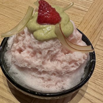 MĀZE - Omakase 4th course. Strawberry shave ice w pistachio crumbles inside, white chocolate cream, shaved rhubarb. - New American Near Me - Honolulu, Hawaii