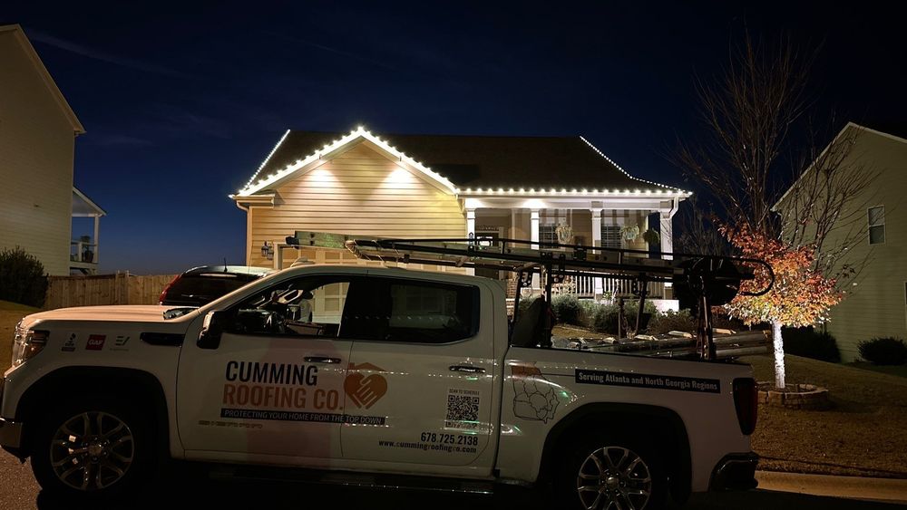 Slide of Cumming Roofing Company