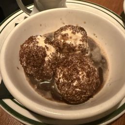 Affogato - Vanilla ice cream with hazelnuts inside with espresso Affogato - Vanilla ice cream with hazelnuts inside with espresso