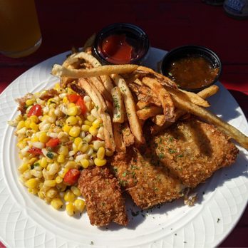The Island Hideaway - Fish of the day, coconut crusted, 'skratch' corn and skinny fries with ketchup and apricot jam - Seafood Near Me - Solomons, Maryland