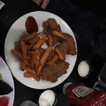 South Lyon Hotel - Chicken tenders and sweet potato fries - Bars Near Me - South Lyon, Michigan South Lyon Hotel - Chicken tenders and sweet potato fries - Bars Near Me - South Lyon, Michigan