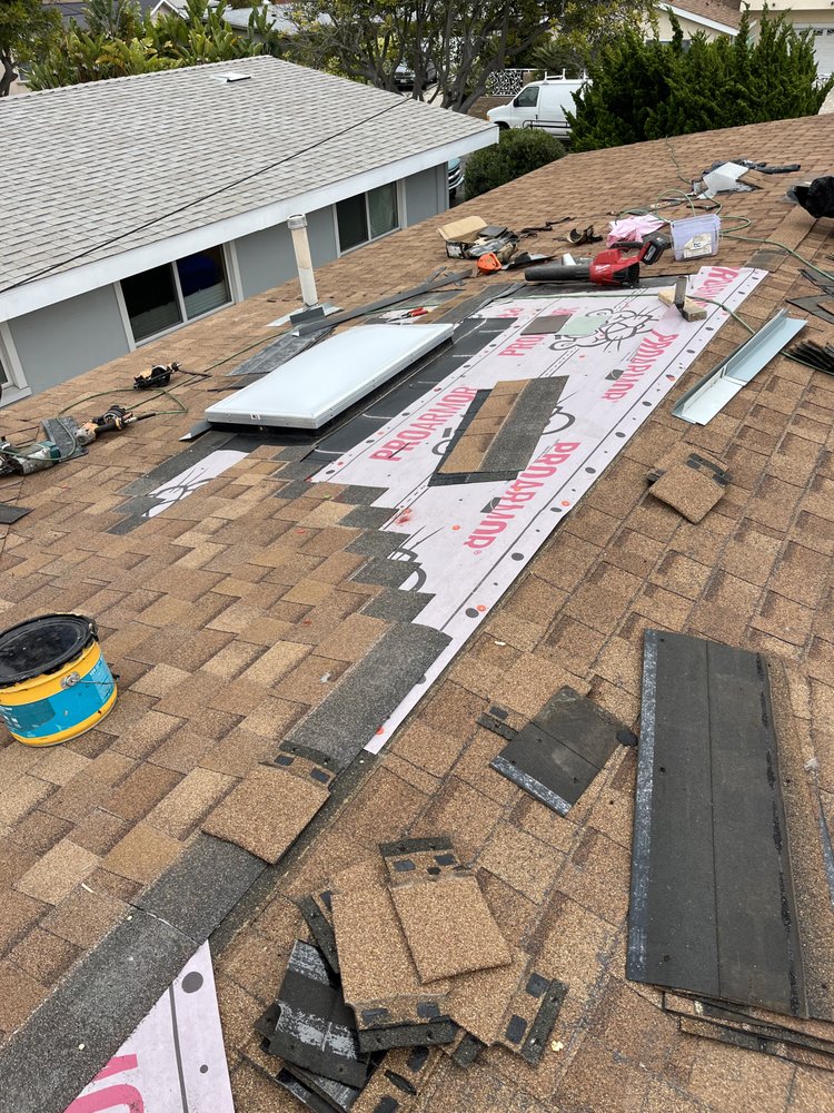 Slide of Tello's Roofing