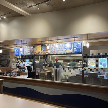 Ivar's Seafood Bar - a woman ordering food - Seafood Near Me - Everett, Washington Ivar's Seafood Bar - a woman ordering food - Seafood Near Me - Everett, Washington