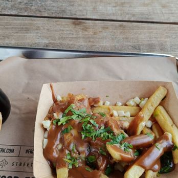 Frittenwerk - Classic Québec poutine menu with Coca cola (already eaten a bit) - Fast Food Near Me - Hanover, NI