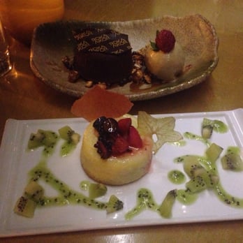 Roka Akor - Chicago - Warm chocolate cake & yuzu "soufflé" cake - Sushi Bars Near Me - Chicago, Illinois Roka Akor - Chicago - Warm chocolate cake & yuzu "soufflé" cake - Sushi Bars Near Me - Chicago, Illinois
