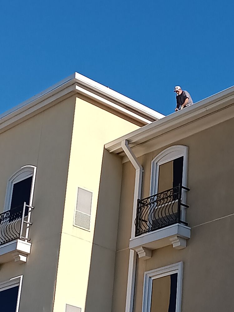 Slide of Armands Roofing