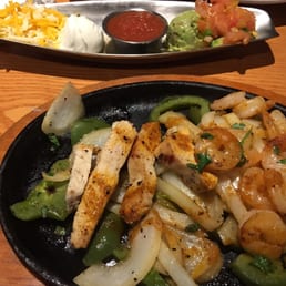 a plate of chicken and vegetables