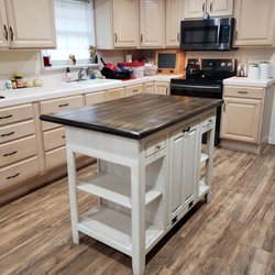 Foxcreek Baskets - Our 36x50 Farmhouse Island with Black Farmhouse Mahogany Top is sure to add charm and warmth to your kitchen.