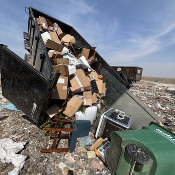 Richie Bros Junk Removal - Dumping our full trailer at the landfill. - Junk Removal & Hauling Near Me - Urbandale, Iowa Richie Bros Junk Removal - Dumping our full trailer at the landfill. - Junk Removal & Hauling Near Me - Urbandale, Iowa