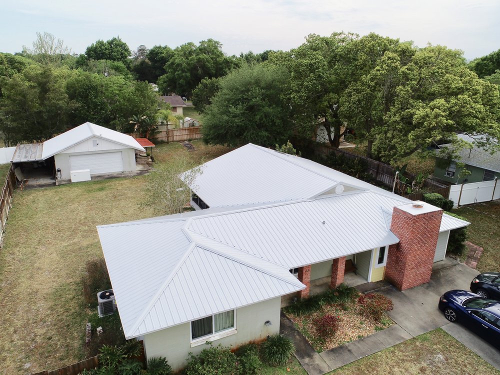 Slide of T Mark Roofing