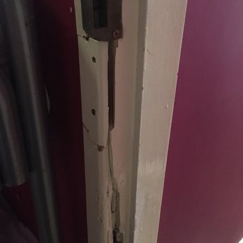 Paddys Palace Hostel - This was the door. Above it you can see cracks which were painted over so clearly this door has been man-handled more than a few times. - Hostels Near Me - Belfast, BFS