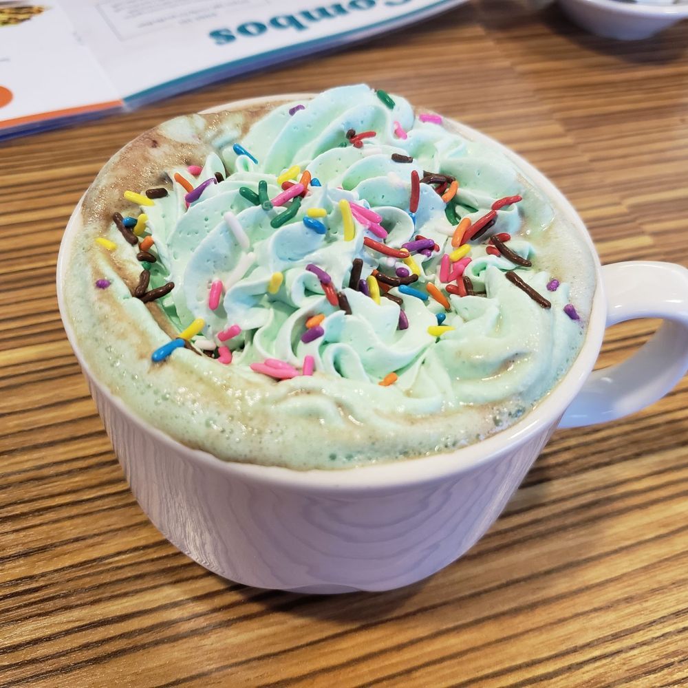 IHOP - Grinch hot chocolate! They ran out of the seasonal sprinkles, so our waitress made mine into a Christmas tree! Delicious! - American Near Me - Douglasville, Georgia IHOP - Grinch hot chocolate! They ran out of the seasonal sprinkles, so our waitress made mine into a Christmas tree! Delicious! - American Near Me - Douglasville, Georgia