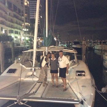 DEA Charters - Captain Dave and his assistant and his boat Semper Fi - Boat Charters Near Me - Miami, Florida