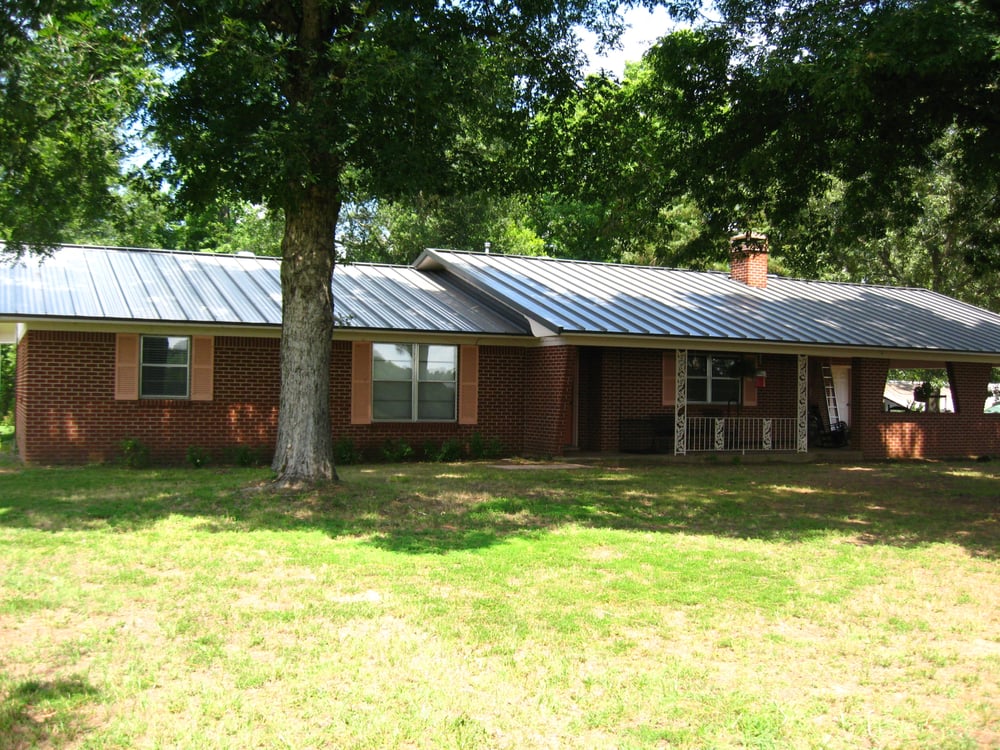 Slide of LMC Roofing & Construction