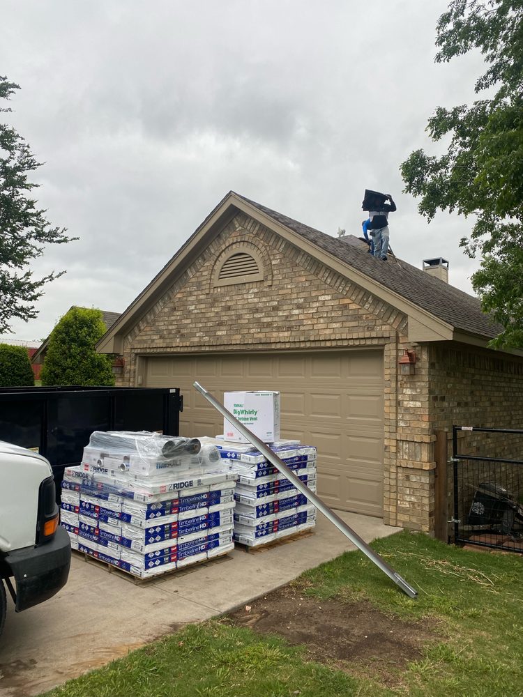 Slide of Mann & Sons Roofing