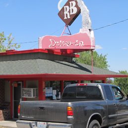 a truck parked in front of a restaurant a truck parked in front of a restaurant