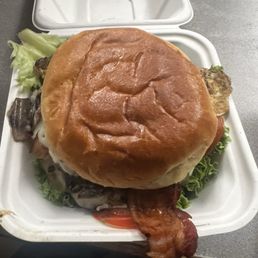 SWISS & SHROOM MELTBURGER Add-ons of bacon, fried egg and tomato SWISS & SHROOM MELTBURGER Add-ons of bacon, fried egg and tomato