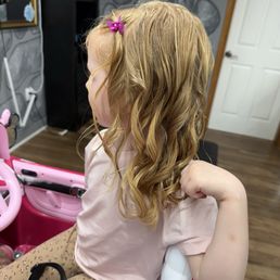 Hair cut, styled with clips