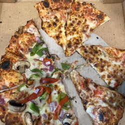 Opa’s Pizzeria - Cheese pizza and veggie pizza.