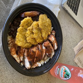 Bongos - Jerk Chicken with the mango slaw subbed for tostones - Cuban Near Me - Seattle, Washington Bongos - Jerk Chicken with the mango slaw subbed for tostones - Cuban Near Me - Seattle, Washington