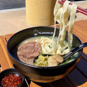 Flaming Ox - 牛骨牛肉麵 Bone Broth Beef Noodle Soup ($17) w/ thick noodles, 1/2 meat + 1/2 tendon (+$1) - Taiwanese Near Me - San Jose, California Flaming Ox - 牛骨牛肉麵 Bone Broth Beef Noodle Soup ($17) w/ thick noodles, 1/2 meat + 1/2 tendon (+$1) - Taiwanese Near Me - San Jose, California