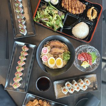 Hamachi - a variety of sushi dishes on a table - Sushi Bars Near Me - Lehi, Utah Hamachi - a variety of sushi dishes on a table - Sushi Bars Near Me - Lehi, Utah
