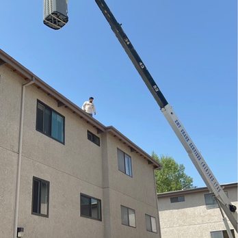 Airflow and EJ Service Air Conditioning & Heating - New AC getting craned onto the roof. - Heating & Air Conditioning/HVAC Near Me - Van Nuys, California