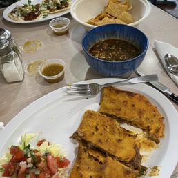Top - street tacos. Chips and salsa(yum). Quesabirria and the broth. Top - street tacos. Chips and salsa(yum). Quesabirria and the broth.