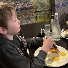 Side of eggs sunny side up and hashbrowns Side of eggs sunny side up and hashbrowns