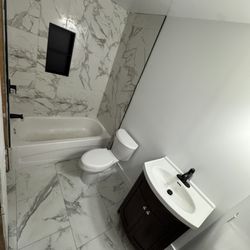 Yugo Contracting - Bathroom reno