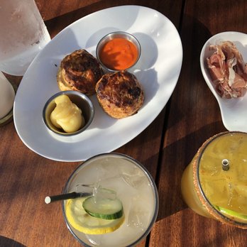 25 Lusk Private Events - Sharp cheddar and jalapeño biscuits with honey butter & pepper jelly; SF Yacht Club (center), Spicy Passionfruit Margarita (right) - Venues & Event Spaces Near Me - San Francisco, California