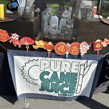 Pure Cane Juice - a man behind a table with a sign that says pure cane juice co - Juice Bars & Smoothies Near Me - San Francisco, California Pure Cane Juice - a man behind a table with a sign that says pure cane juice co - Juice Bars & Smoothies Near Me - San Francisco, California