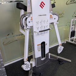 Elev8 Fitness - Not quite a free motion machine because the arms only rotate one direction but liked the feel more - locked in a good position