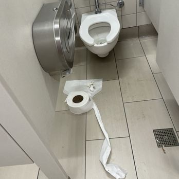 Target - Poop toilet paper on the floor AND poop on the toilet - Department Stores Near Me - Long Beach, California
