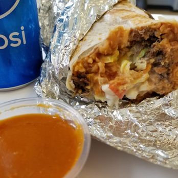 Taco Fam - The generosity sized barbacoa burrito, stuffed with rice, beans, lettuce, tomatoes, and sour cream. - Mexican Near Me - Napoleon, Ohio Taco Fam - The generosity sized barbacoa burrito, stuffed with rice, beans, lettuce, tomatoes, and sour cream. - Mexican Near Me - Napoleon, Ohio