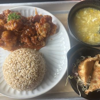 Vivienne's Bistro - General Tsos Chicken lunch with brown rice, egg flower drop soup and potstickers - Asian Fusion Near Me - Mercer Island, Washington Vivienne's Bistro - General Tsos Chicken lunch with brown rice, egg flower drop soup and potstickers - Asian Fusion Near Me - Mercer Island, Washington
