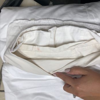 Macy's - Used, stained rolled duvet into the outer pillowcase. Clearly discolored, used and had visible stains - Department Stores Near Me - Santa Clarita, California