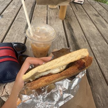 Dave's Coffee - Bacon egg and cheese on biscuit, plus coffee milk iced latte - Coffee & Tea Near Me - Charlestown, Rhode Island