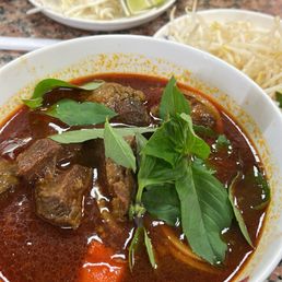 Beef Stew. Can either get it with a side of bread or pho noodles. I opted for the noodles