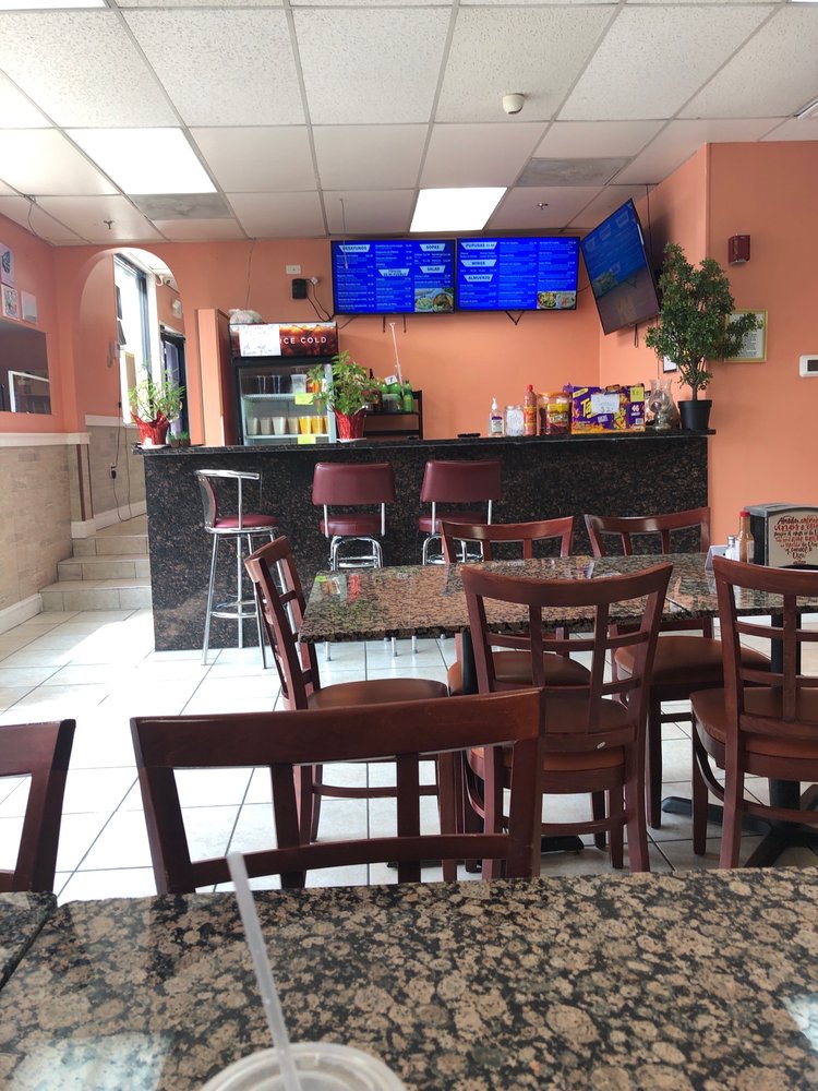 Mi Pueblo Market y Deli Logo
