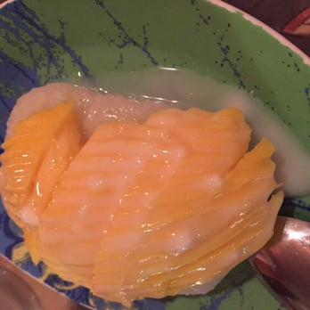 Simply Thai & Sushi - Mango sticky rice. Raw, cold mango atop sticky rice with trace of coconut sauce. - Thai Near Me - Old Hickory, Tennessee Simply Thai & Sushi - Mango sticky rice. Raw, cold mango atop sticky rice with trace of coconut sauce. - Thai Near Me - Old Hickory, Tennessee