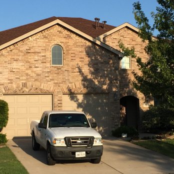 Cardinal Exteriors & Roofing - Roofing work completed in the same day. Hickory shingles looks good in this clear bricks. - Roofing Near Me - Allen, Texas Cardinal Exteriors & Roofing - Roofing work completed in the same day. Hickory shingles looks good in this clear bricks. - Roofing Near Me - Allen, Texas