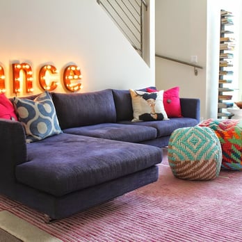 Noble Design Group - A custom sectional gets extra cozy with colorful throw pillows and personal touches. - Interior Design Near Me Noble Design Group - A custom sectional gets extra cozy with colorful throw pillows and personal touches. - Interior Design Near Me