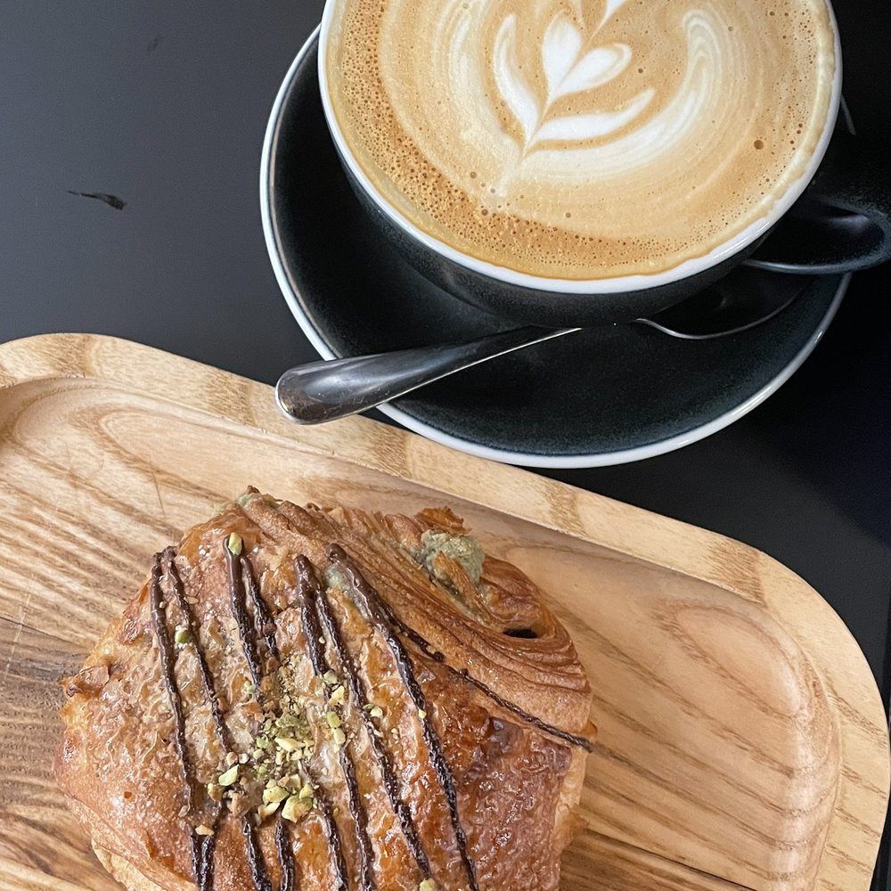 Cafe 295 - Latte and pistachio croissant - Cafes Near Me - Toronto, Ontario Cafe 295 - Latte and pistachio croissant - Cafes Near Me - Toronto, Ontario