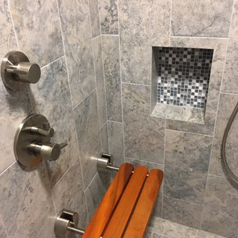 Italian Heritage Tile & Stone - 2 bench seats to accommodate shaving of the legs, relaxing or taking advantage of the steam shower. - General Contractors Near Me Italian Heritage Tile & Stone - 2 bench seats to accommodate shaving of the legs, relaxing or taking advantage of the steam shower. - General Contractors Near Me