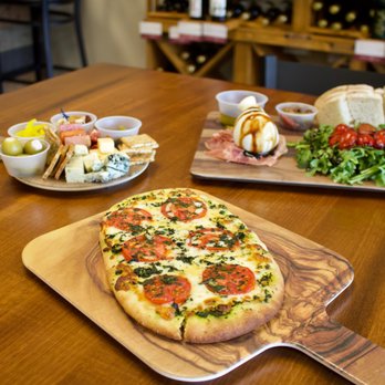 Coastal Expressions Wine Bar  -  pizza on a cutting board - Wine Bars Near Me - Punta Gorda, Florida