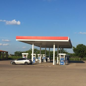 Copper Ridge Market - a gas station with a white car parked in front of it - Gas Stations Near Me - Georgetown, Texas Copper Ridge Market - a gas station with a white car parked in front of it - Gas Stations Near Me - Georgetown, Texas