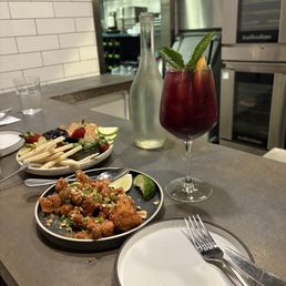 Thai Cauliflower  and peanuts with cheese plate and sangria.