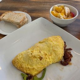 Veggie Omelet with Bacon, Sourdough toast and Fruit Veggie Omelet with Bacon, Sourdough toast and Fruit