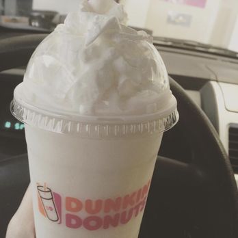 Dunkin' - a hand holding a cup of ice cream - Donuts Near Me - Fort Leonard Wood, Missouri Dunkin' - a hand holding a cup of ice cream - Donuts Near Me - Fort Leonard Wood, Missouri